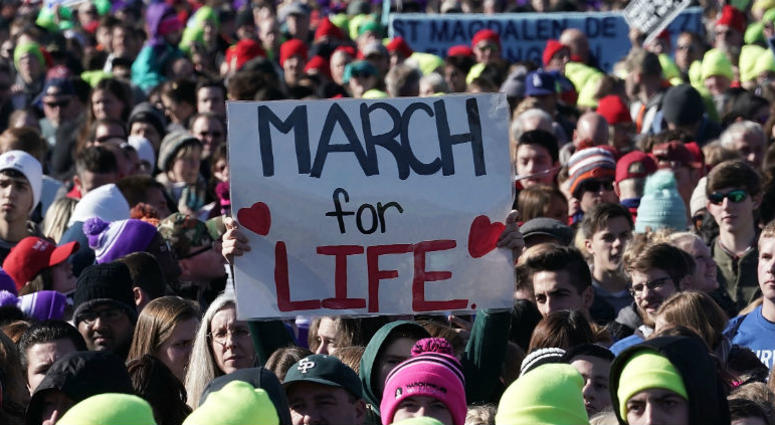 Pro-life activists participate in a rally at the National Mall prior to the 2018 March for Life January 19, 2018 in Washington, DC. March For Life