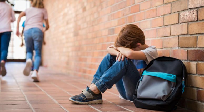 Child unhappy at school. Child unhappy at school.