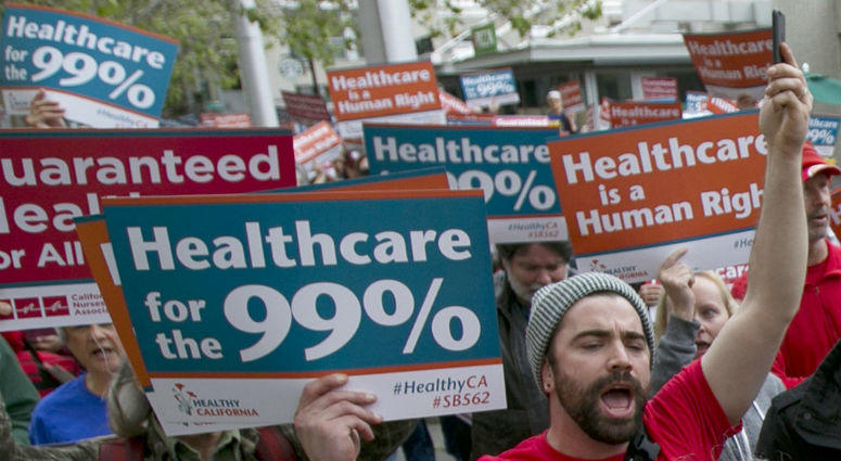 In the April 26, 2017 file photo, supporters of single-payer health care march to the Capitol in Sacramento, Calif. Large majorities of young Americans want to see an expansion of government services.