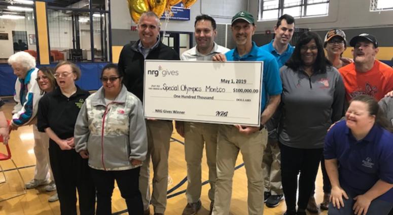 (L) Mike Starck, NRG Retail East Vice President; (C) NRG employee Brett Guerin, who nominated Special Olympics; (R) Scott Otterbein, Montgomery County Special Olympics Manager.