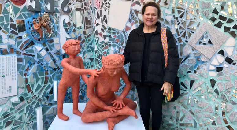 Nora Litz, of Puentes de Salud, is lead artist of the new exhibit "Vidas Suspendidas" at Philadelphia's Magic Gardens through November 18.