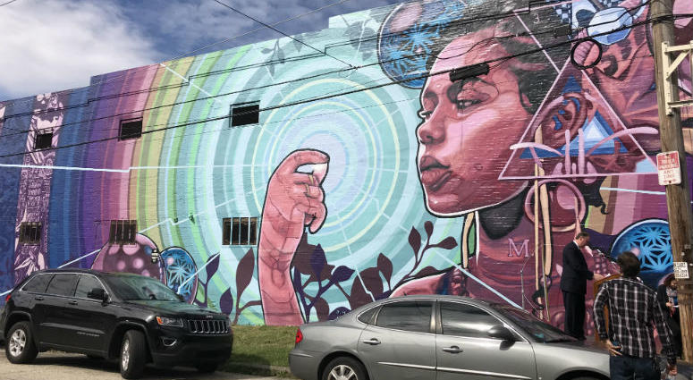 The "Dreams, Diaspora and Destiny" mural by Mural Arts Philadelphia features an augmented reality experience. "Dreams, Diaspora and Destiny" mural