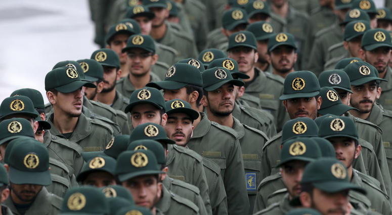 Iranian Revolutionary Guard members arrive for a ceremony celebrating the 40th anniversary of the Islamic Revolution, at the Azadi, or Freedom, Square, in Tehran, Iran. Iranian Revolutionary Guard members arrive for a ceremony celebrating the 40th anniversary of the Islamic Revolution, at the Azadi, or Freedom, Square, in Tehran, Iran.