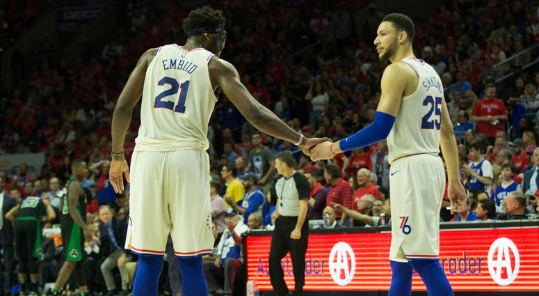 Philadelphia 76ers center Joel Embiid (21) and guard Ben Simmons (25) during the fourth quarter in game four of the second round of the 2018 NBA Playoffs against the Boston Celtics at Wells Fargo Center. Philadelphia 76ers center Joel Embiid (21) and guard Ben Simmons (25)