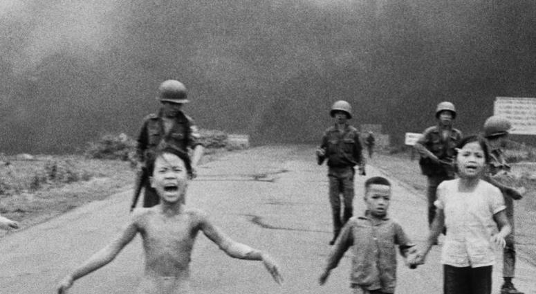 In this June 8, 1972 file photo, South Vietnamese forces follow after terrified children, including 9-year-old Kim Phuc. In this June 8, 1972 file photo, South Vietnamese forces follow after terrified children, including 9-year-old Kim Phuc.