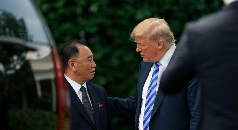 President Donald Trump talks with Kim Yong Chol, former North Korean military intelligence chief and one of leader Kim Jong Un's closest aides, after their meeting in the Oval Office of the White House in Washington, Friday, June 1, 2018. President Donald Trump talks with Kim Yong Chol