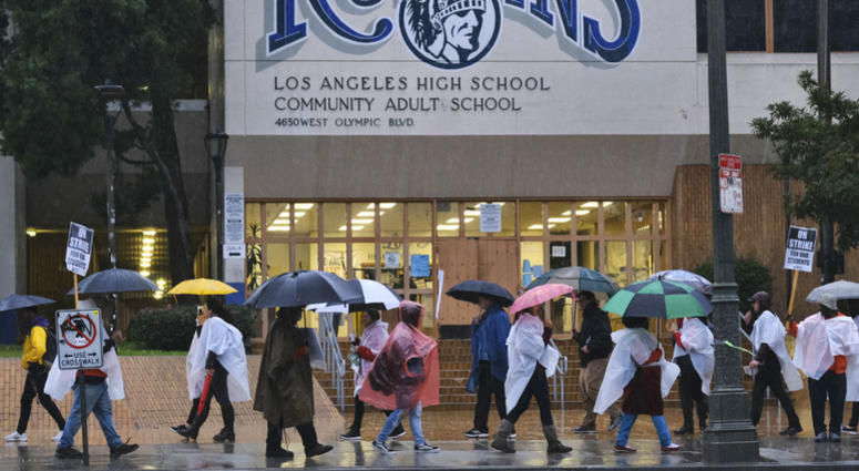 Los Angeles Unified District teacher brave the pouring rain to join in a picket line during a citywide teacher strike in front of Los Angeles High School on Monday, Jan. 14, 2019. Los Angeles Unified District teacher brave the pouring rain to join in a picket line during a citywide teacher strike in front of Los Angeles High School on Monday, Jan. 14, 2019.