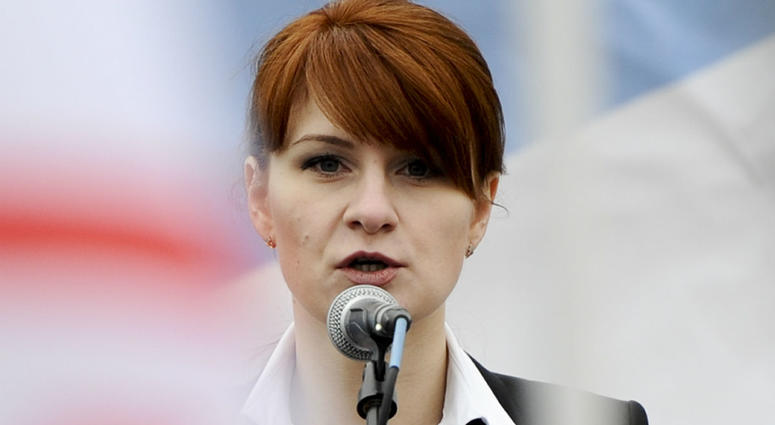 In this April 21, 2013 file photo, Maria Butina, leader of a pro-gun organization in Russia, speaks to a crowd during a rally in support of legalizing the possession of handguns in Moscow, Russia. In this April 21, 2013 file photo, Maria Butina, leader of a pro-gun organization in Russia, speaks to a crowd during a rally in support of legalizing the possession of handguns in Moscow, Russia.