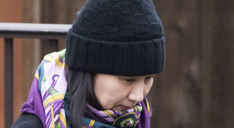 In this Wednesday, Dec. 12, 2018 file photo, Huawei chief financial officer Meng Wanzhou leaves her home in Vancouver, British Columbia. In this Wednesday, Dec. 12, 2018 file photo, Huawei chief financial officer Meng Wanzhou leaves her home in Vancouver, British Columbia.