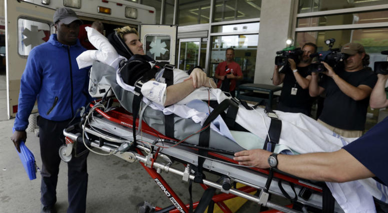 In this May 31, 2018, file photo, Ryan Straschnitzki is wheeled on a stretcher into Shriners Hospitals for Children in Philadelphia. In this May 31, 2018, file photo, Ryan Straschnitzki is wheeled on a stretcher into Shriners Hospitals for Children in Philadelphia.
