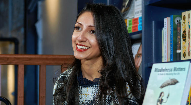 Pax Tandon is shown at a book signing event for "Mindfulness Matters." Pax Tandon is shown at a book signing event for "Mindfulness Matters."