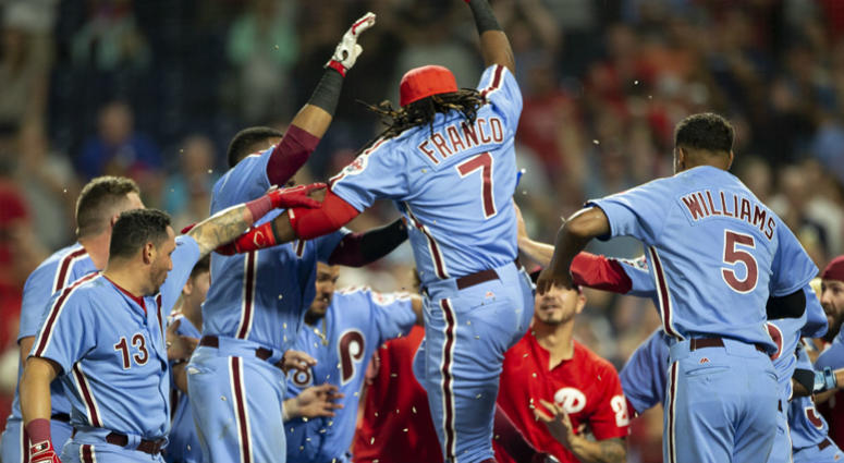 Philadelphia Phillies' Maikel Franco (7) is congratulated at home plate after hitting a walk-off three-run home run against the Miami Marlins in a baseball game Thursday, Aug. 2, 2018, in Philadelphia. Philadelphia Phillies' Maikel Franco (7) is congratulated at home plate after hitting a walk-off three-run home run against the Miami Marlins in a baseball game Thursday, Aug. 2, 2018, in Philadelphia.