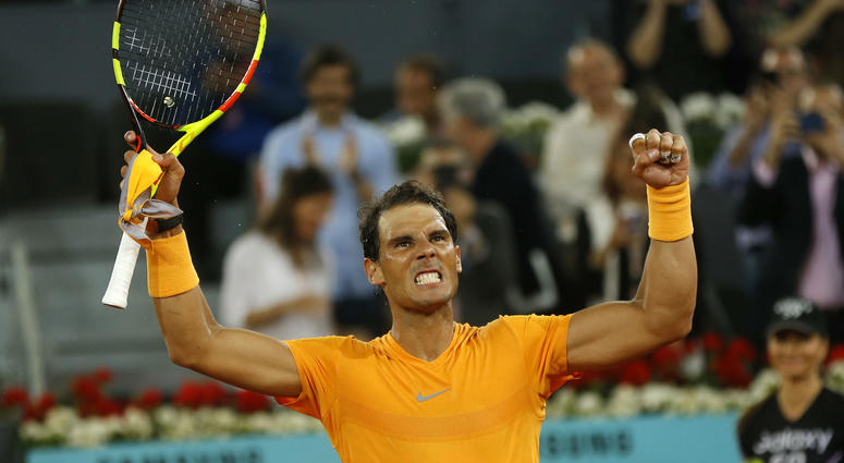 Rafael Nadal from Spain celebrates his victory over Diego Schwartzman from Argentina during a Madrid Open tennis tournament match in Madrid, Spain, Thursday, May 10, 2018. Nadal won 6-3, 6-4. Rafael Nadal from Spain celebrates his victory over Diego Schwartzman from Argentina during a Madrid Open tennis tournament match in Madrid, Spain, Thursday, May 10, 2018. Nadal won 6-3, 6-4.