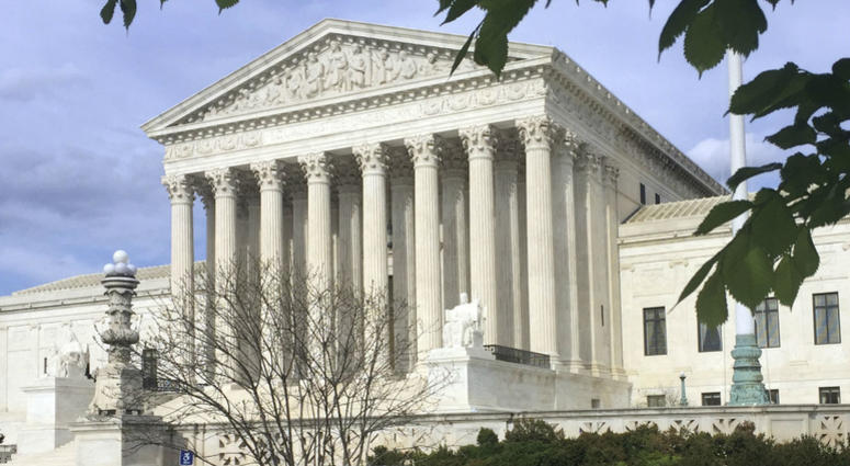 This April 23, 2018, file photo shows the Supreme Court in Washington. The Supreme Court says states can force online shoppers to pay sales tax. This April 23, 2018, file photo shows the Supreme Court in Washington. The Supreme Court says states can force online shoppers to pay sales tax.