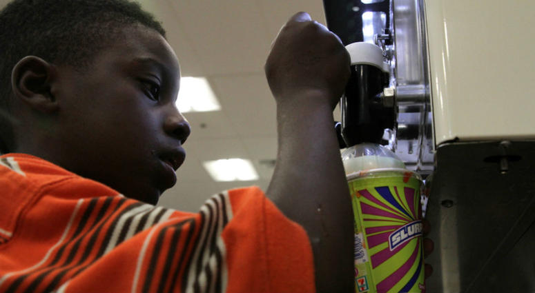 Ray Jenkins, 6, makes a Slurpee at a 7-Eleven in Baltimore. Ray Jenkins, 6, makes a Slurpee at a 7-Eleven in Baltimore.