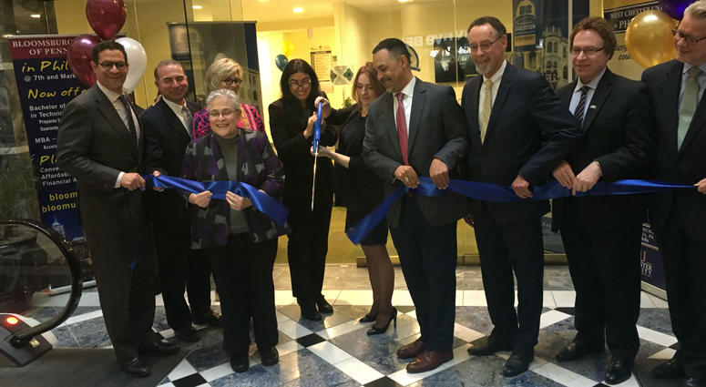 Representatives from the Pennsylvania State System of Higher Education join with local officials in cutting the ribbon on new classrooms and an academic suite of offices in center city Philadelphia. Representatives from the Pennsylvania State System of Higher Education