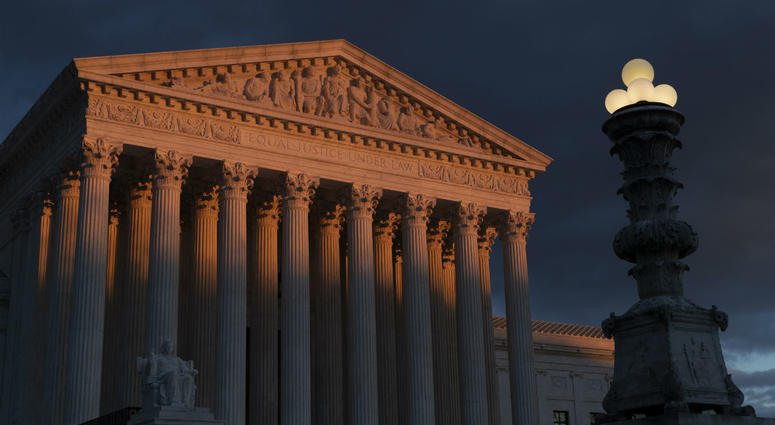 In this Jan. 24, 2019, file photo, the Supreme Court is seen at sunset in Washington. In this Jan. 24, 2019, file photo, the Supreme Court is seen at sunset in Washington.