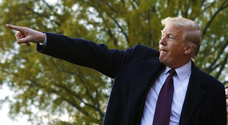 President Donald Trump points as he greets supporters before boarding Marine One on the South Lawn of the White House in Washington, Tuesday, Nov. 20, 2018, for the short trip to Andrews Air Force Base and on to n route to Palm Beach International Airport