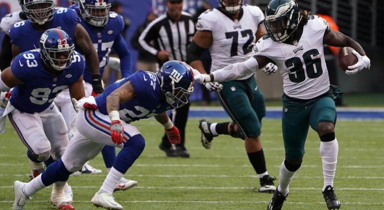 Philadelphia Eagles running back Jay Ajayi (36) pushes New York Giants safety Darian Thompson (27) on way to a first down in the second half at MetLife Stadium on Dec. 17, 2017. Philadelphia Eagles at New York Giants 2017