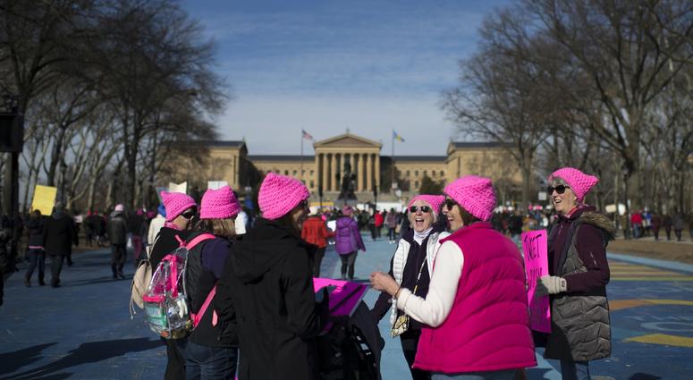 A group of women wearing pink hats gather in front of the Philadelphia Museum of Art at the Women's March, Jan. 20, 2018. Philadelphia Women's March