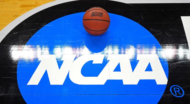 A view of the NCAA logo and basketball before a game of the 2018 NCAA Tournament. NCAA Logo