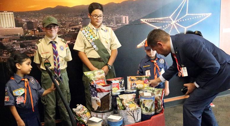 Mario Perez, right, Scout Executive and CEO for the Boy Scouts of America Yucca Council, checks the placement of popcorn on a wagon with scouts Monday at El Paso City Hall on Aug. 6, 2018. Mario Perez, right, Scout Executive and CEO for the Boy Scouts of America Yucca Council, checks the placement of popcorn on a wagon with scouts Monday at El Paso City Hall on Aug. 6, 2018.