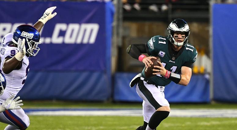 Eagles quarterback Carson Wentz (11) runs the ball in the third quarter against the New York Giants at MetLife Stadium. Carson Wentz
