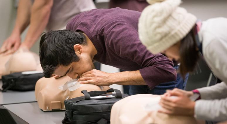 UI grad student Parth Kotak practices CPR breaths into a practice dummy at the UI Campus Recreation & Wellness Center on Monday, October 29, 2018. Students practice CPR