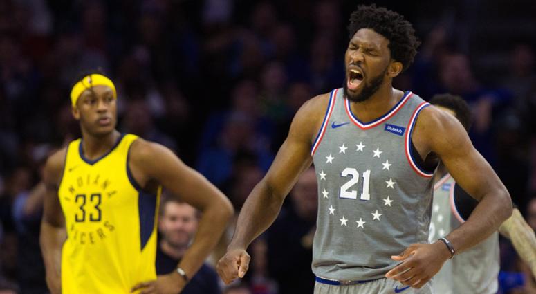 Philadelphia 76ers center Joel Embiid (21) reacts in front of Indiana Pacers center Myles Turner (33) after a score and foul during the second quarter at Wells Fargo Center. Joel Embiid