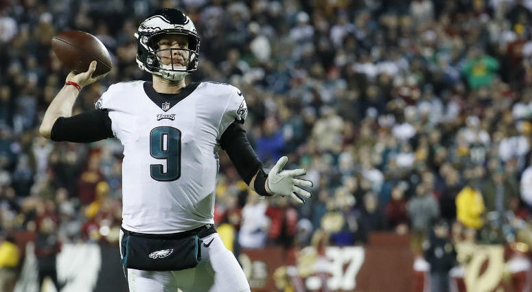 Dec 30, 2018; Landover, MD, USA; Philadelphia Eagles quarterback Nick Foles (9) throws a touchdown pass against the Washington Redskins in the second quarter at FedEx Field. Dec 30, 2018; Landover, MD, USA; Philadelphia Eagles quarterback Nick Foles (9) throws a touchdown pass against the Washington Redskins in the second quarter at FedEx Field.