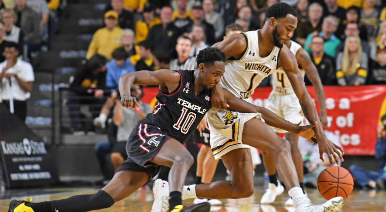 Jan 6, 2019; Wichita, KS, USA; Temple Owls guard Shizz Alston Jr. (10) reaches in for the ball against Wichita State Shockers forward Markis McDuffie (1) during the second half at Charles Koch Arena. Jan 6, 2019; Wichita, KS, USA; Temple Owls guard Shizz Alston Jr. (10) reaches in for the ball against Wichita State Shockers forward Markis McDuffie (1) during the second half at Charles Koch Arena.
