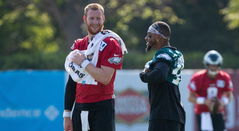 Jul 26, 2019; Philadelphia, PA, USA; Philadelphia Eagles quarterback Carson Wentz (11) and wide receiver DeSean Jackson (10) talks during training camp at Novacare Complex. Eagles player DeSean Jackson and Carson Wentz.