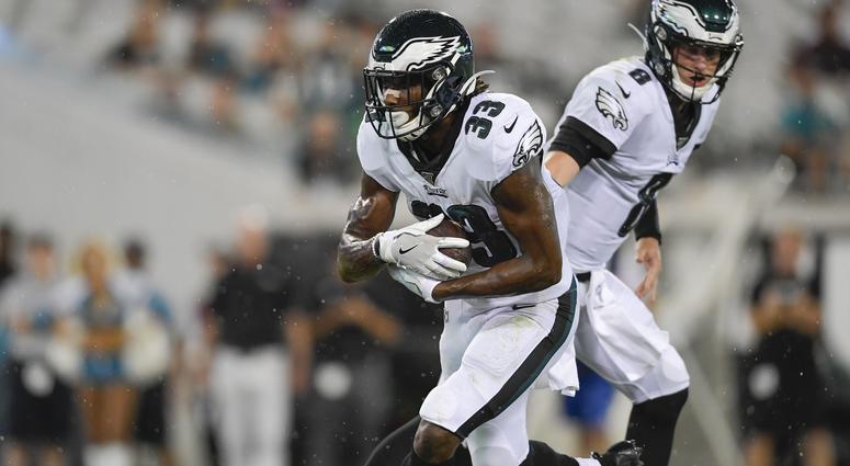 Aug 15, 2019; Jacksonville, FL, USA; Philadelphia Eagles quarterback Clayton Thorson (8) hands the ball off to running back Josh Adams (33) for a touchdown against the Jacksonville Jaguars during the third quarter at TIAA Bank Field. Aug 15, 2019; Jacksonville, FL, USA; Philadelphia Eagles quarterback Clayton Thorson (8) hands the ball off to running back Josh Adams (33) for a touchdown against the Jacksonville Jaguars during the third quarter at TIAA Bank Field.