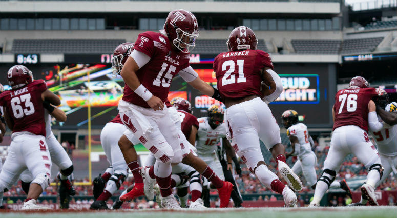 Sep 14, 2019; Philadelphia, PA, USA; Temple Owls quarterback Anthony Russo (15) hands off to running back Jager Gardner (21) during the first quarter against the Maryland Terrapinsat Lincoln Financial Field. Philadelphia, PA, USA; Temple Owls quarterback Anthony Russo (15) hands off to running back Jager Gardner (21) during the first quarter against the Maryland Terrapinsat Lincoln Financial Field.
