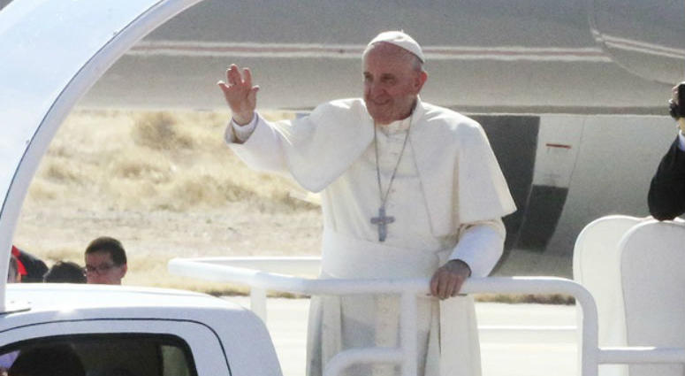 File photo: Pope Francis blesses the crowd after boarding his Popemobile at Abraham Gonzalez Airport in Ciudad Juarez. Pope Francis