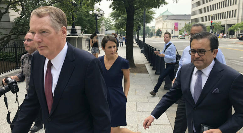 United States Trade Representative Robert Lighthizer, left, and Mexican Secretary of Economy Idelfonso Guajardo, right, walk to the White House on Monday August 27, 2018. United States Trade Representative Robert Lighthizer, left, and Mexican Secretary of Economy Idelfonso Guajardo, right, walk to the White House on Monday August 27, 2018.