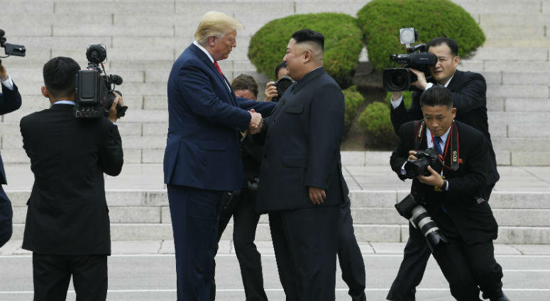President Donald Trump walks to the North Korean side of the border with North Korean leader Kim Jong Un at the border village of Panmunjom in the Demilitarized Zone, Sunday, June 30, 2019, in North Korea. President Donald Trump walks to the North Korean side of the border with North Korean leader Kim Jong Un at the border village of Panmunjom in the Demilitarized Zone, Sunday, June 30, 2019, in North Korea.