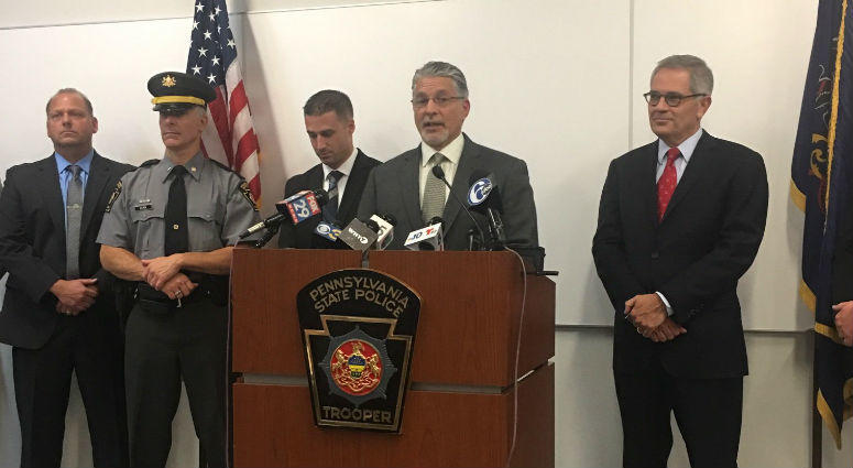 DA Larry Krasner and state police announce the arrest of Theodore Dill Donahue, accused of killing the 27-year-old in Philadelphia. DA Larry Krasner and Pa. State Police at a press conference.