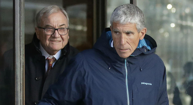 William "Rick" Singer, front, founder of the Edge College & Career Network, exits federal court in Boston on Tuesday, March 12, 2019, after he pleaded guilty to charges in a nationwide college admissions bribery scandal. William "Rick" Singer, front, founder of the Edge College & Career Network, exits federal court in Boston on Tuesday, March 12, 2019, after he pleaded guilty to charges in a nationwide college admissions bribery scandal.