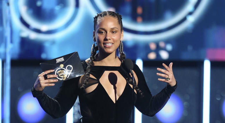 In this Jan. 28, 2018 file photo, Alicia Keys presents the award for record of the year at the 60th annual Grammy Awards at Madison Square Garden in New York. In this Jan. 28, 2018 file photo, Alicia Keys presents the award for record of the year at the 60th annual Grammy Awards at Madison Square Garden in New York.