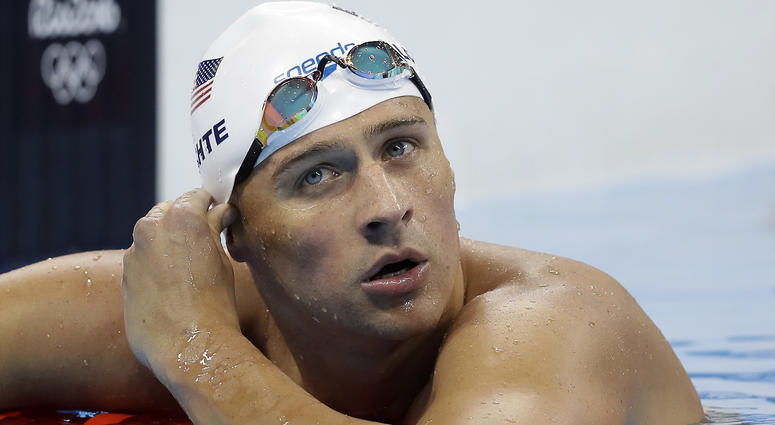 In this Aug. 9, 2016, file photo, United States' Ryan Lochte checks his time in a men's 4x200-meter freestyle heat at the 2016 Summer Olympics, in Rio de Janeiro, Brazil. In this Aug. 9, 2016, file photo, United States' Ryan Lochte checks his time in a men's 4x200-meter freestyle heat at the 2016 Summer Olympics, in Rio de Janeiro, Brazil.