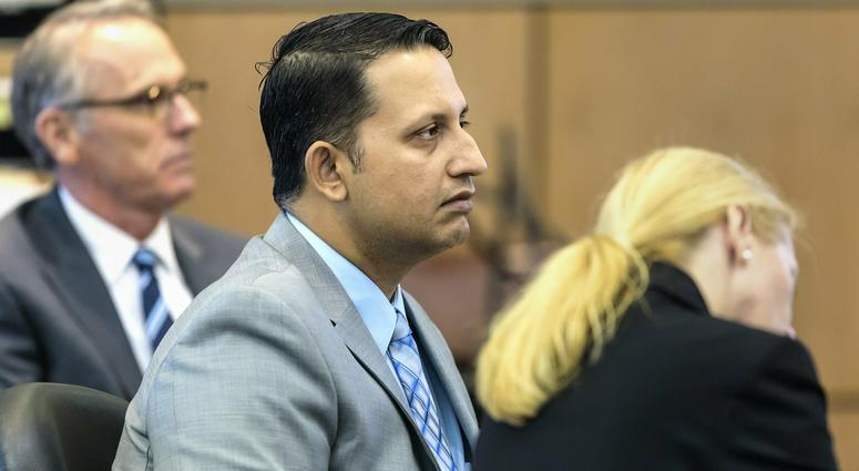 Nouman Raja sits between defense attorney Scott Richardson, left, and paralegal Debi Stratton as attorney Richard Lubin gives his closing arguments in Raja's trial, Wednesday, March 6, 2019 in West Palm Beach, Fla. Nouman Raja sits between defense attorney Scott Richardson, left, and paralegal Debi Stratton as attorney Richard Lubin gives his closing arguments in Raja's trial, Wednesday, March 6, 2019 in West Palm Beach, Fla.