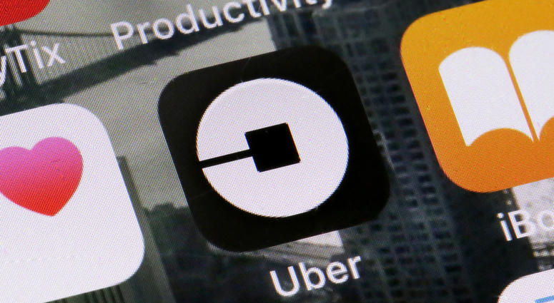 This June 12, 2018, file photo shows the Uber app on a phone in New York. This June 12, 2018, file photo shows the Uber app on a phone in New York.