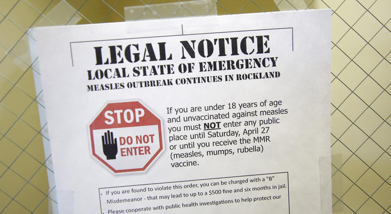 This March 27, 2019 file photo shows a sign explaining the local state of emergency because of a measles outbreak at the Rockland County Health Department in Pomona, N.Y. This March 27, 2019 file photo shows a sign explaining the local state of emergency because of a measles outbreak at the Rockland County Health Department in Pomona, N.Y.