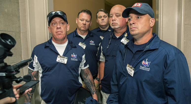 Sept. 11 first responders John Feal, left, Ret. Lt. Michael O'Connell, right, and other first responders speak to reporters as they leave the office of Senate Majority Leader Mitch McConnell, following their meeting at McConnell's office on Capitol Hill. Sept. 11 first responders John Feal, left, Ret. Lt. Michael O'Connell, right, and other first responders speak to reporters as they leave the office of Senate Majority Leader Mitch McConnell, following their meeting at McConnell's office on Capitol Hill.