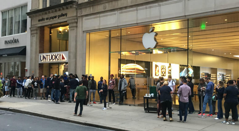 Shoppers line up outside of the Apple store on Walnut Street in Center City Philadelphia. Shoppers line up outside of the Apple store on Walnut Street in Center City Philadelphia.