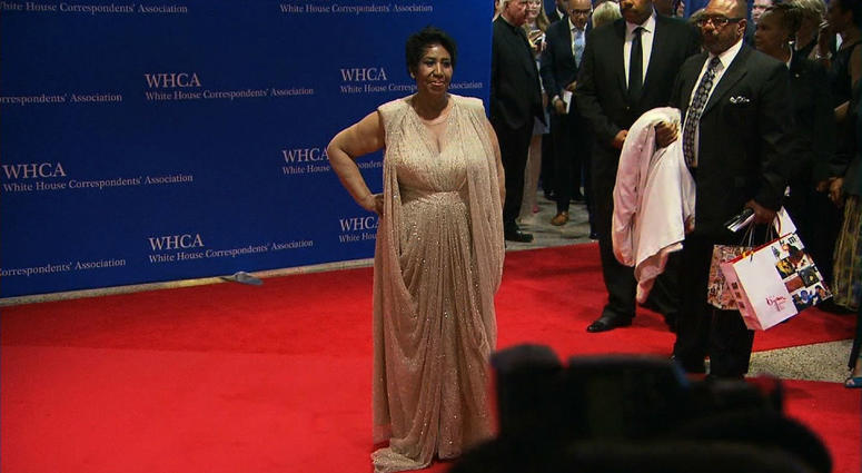 Singer Aretha Franklin poses for pictures on the red carpet at the 2016 The White House correspondents' dinner. White House correspondents' dinner red carpet