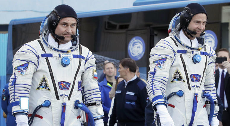 From left, Russian cosmonaut Alexey Ovchinin and U.S. astronaut Nick Hague walk prior to the launch of Soyuz MS-10 space ship at the Russian leased Baikonur cosmodrome, Kazakhstan, Thursday, Oct. 11, 2018. US, Russian astronauts safe after emergency landing
