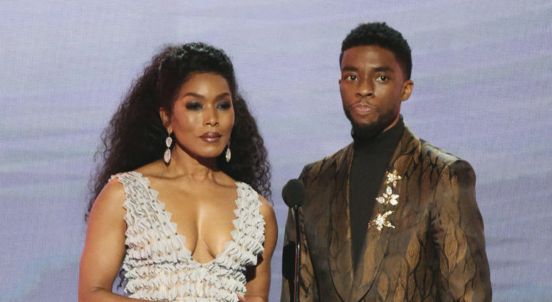 Angela Bassett, left, and Chadwick Boseman, nominated for outstanding performance by a cast in a motion picture, introduce a clip from their film "Black Panther" at the 25th annual Screen Actors Guild Awards at the Shrine Auditorium & Expo Hall in L.A. Angela Bassett, left, and Chadwick Boseman, nominated for outstanding performance by a cast in a motion picture, introduce a clip from their film "Black Panther" at the 25th annual Screen Actors Guild Awards at the Shrine Auditorium & Expo Hall in L.A.