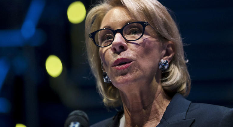 In this Sept. 17, 2018 file photo, Education Secretary Betsy DeVos speaks during a student town hall at National Constitution Center in Philadelphia. In this Sept. 17, 2018 file photo, Education Secretary Betsy DeVos speaks during a student town hall at National Constitution Center in Philadelphia.